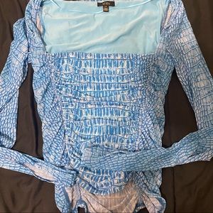 Blue snake print top- price firm